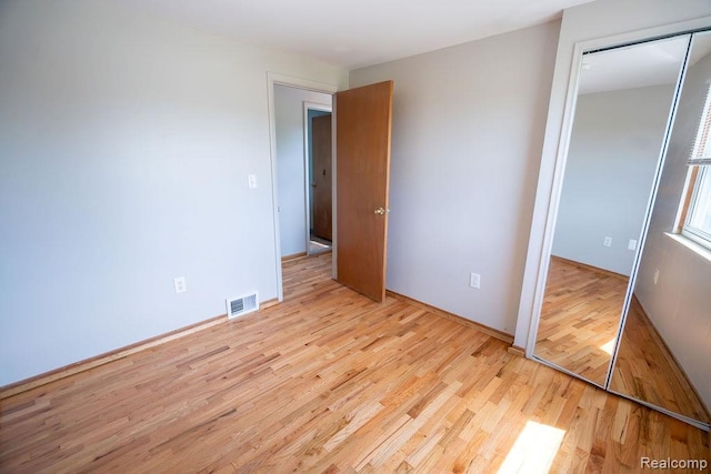 15065 Westlake St, Taylor, MI 48180 - unfurnished bedroom with light wood finished floors and a closet