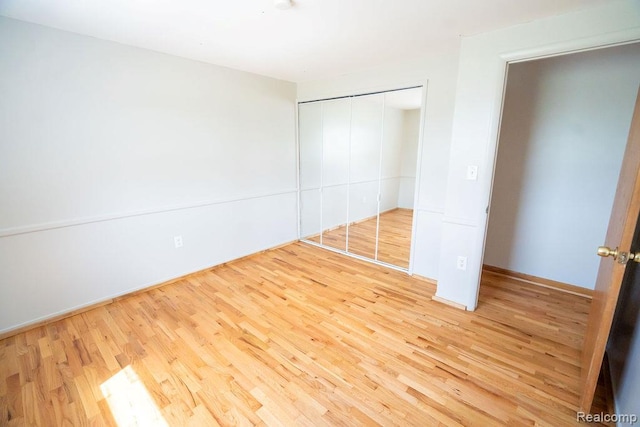 15065 Westlake St, Taylor, MI 48180 - unfurnished bedroom featuring wood finished floors and a closet