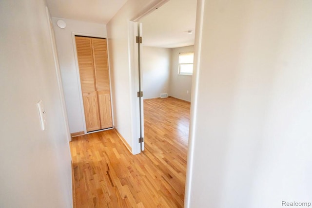 15065 Westlake St, Taylor, MI 48180 - corridor featuring light wood-style floors and baseboards