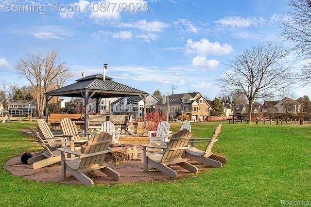 1079 Forest Bay Dr, Waterford, MI 48328 - view of green lawn with a gazebo, a fire pit, and a residential view