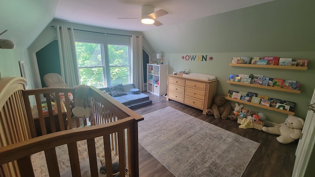 11390 Patterson Rd, Ravenna, MI 49451 - bedroom featuring lofted ceiling, wood finished floors, and a ceiling fan