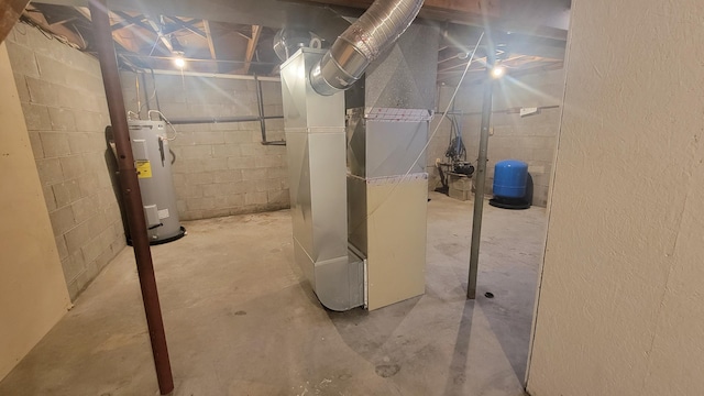 11390 Patterson Rd, Ravenna, MI 49451 - unfinished basement featuring water heater, heating unit, and a water pressure tank