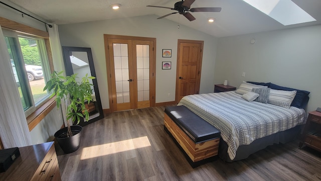 11390 Patterson Rd, Ravenna, MI 49451 - bedroom with vaulted ceiling, wood finished floors, a skylight, baseboards, and recessed lighting