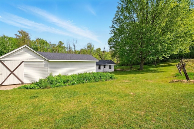 2877 Bessemer Rd, Coloma, MI 49038 - view of grassy yard with an outdoor structure