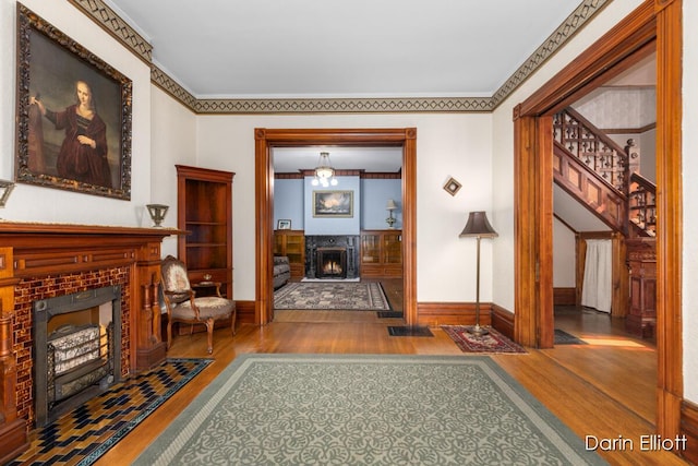 216 E Main St, Ionia, MI 48846 - hallway with wood finished floors and baseboards