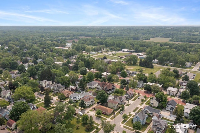 216 E Main St, Ionia, MI 48846 - aerial perspective of suburban area with a forest