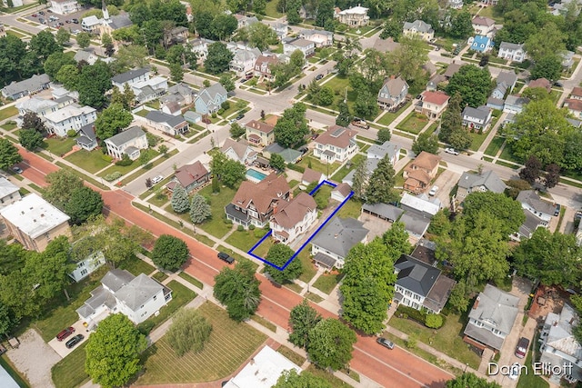 216 E Main St, Ionia, MI 48846 - aerial perspective of suburban area with property boundaries highlighted