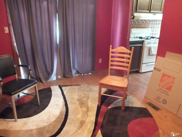 411 Norwood Dr, Monroe, MI 48161 - living area with light wood-type flooring