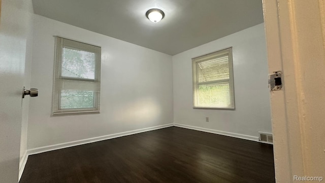 19978 Grandview St, Detroit, MI 48219 - unfurnished room featuring dark wood finished floors and baseboards