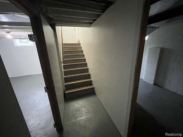 19978 Grandview St, Detroit, MI 48219 - stairway featuring concrete floors and concrete block wall