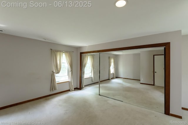 5590 Bayswater Rd, West Bloomfield, MI 48322 - unfurnished bedroom featuring baseboards and carpet flooring