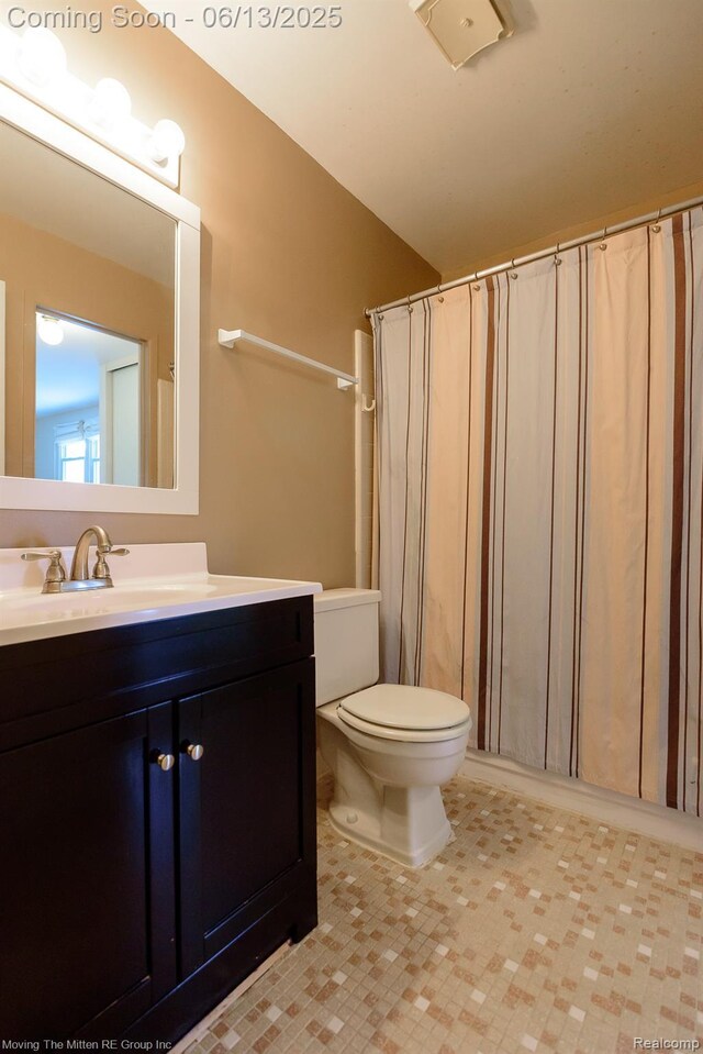 5590 Bayswater Rd, West Bloomfield, MI 48322 - bathroom featuring vanity and tile patterned flooring