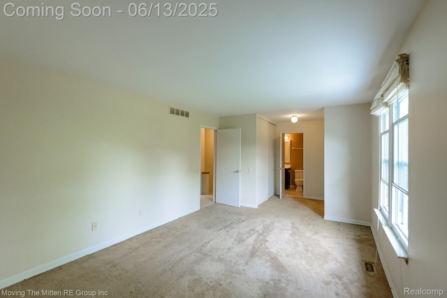 5590 Bayswater Rd, West Bloomfield, MI 48322 - spare room featuring light colored carpet and baseboards