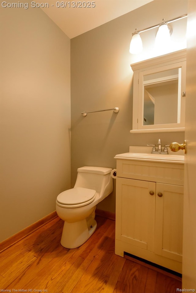5590 Bayswater Rd, West Bloomfield, MI 48322 - bathroom featuring vanity and wood finished floors