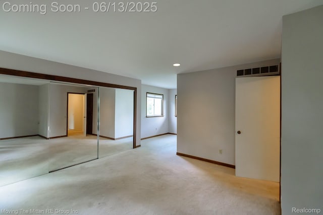 5590 Bayswater Rd, West Bloomfield, MI 48322 - unfurnished bedroom with light carpet, recessed lighting, and a closet