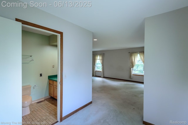 5590 Bayswater Rd, West Bloomfield, MI 48322 - corridor with light colored carpet and recessed lighting