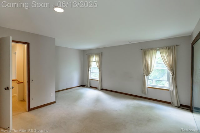 5590 Bayswater Rd, West Bloomfield, MI 48322 - carpeted empty room featuring baseboards