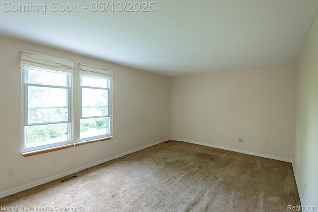 5590 Bayswater Rd, West Bloomfield, MI 48322 - carpeted empty room featuring plenty of natural light