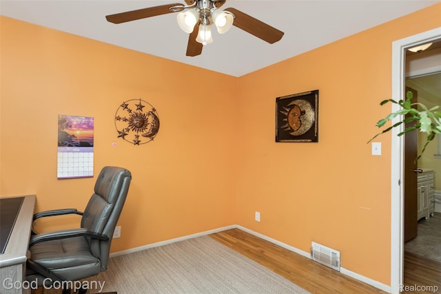 32712 Columbus Dr, Warren, MI 48088 - office space with a ceiling fan, baseboards, and wood finished floors