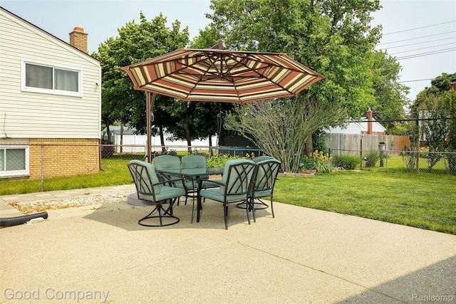 32712 Columbus Dr, Warren, MI 48088 - view of patio / terrace featuring outdoor dining space and a trampoline