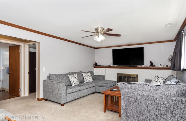 32712 Columbus Dr, Warren, MI 48088 - living area with a ceiling fan, carpet, ornamental molding, baseboards, and a brick fireplace