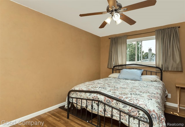 32712 Columbus Dr, Warren, MI 48088 - bedroom with baseboards, wood finished floors, and ceiling fan