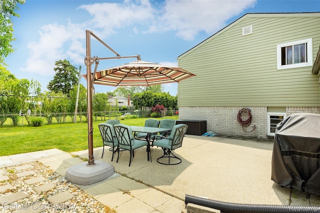 32712 Columbus Dr, Warren, MI 48088 - view of patio with outdoor dining space and a grill