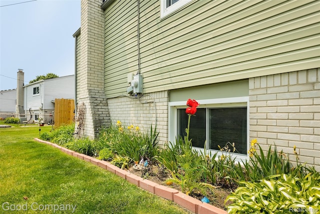32712 Columbus Dr, Warren, MI 48088 - view of home's exterior featuring brick siding