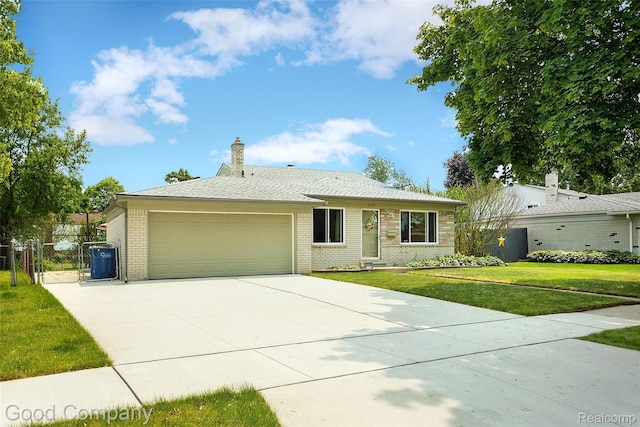32712 Columbus Dr, Warren, MI 48088 - single story home with brick siding, driveway, a garage, and a chimney