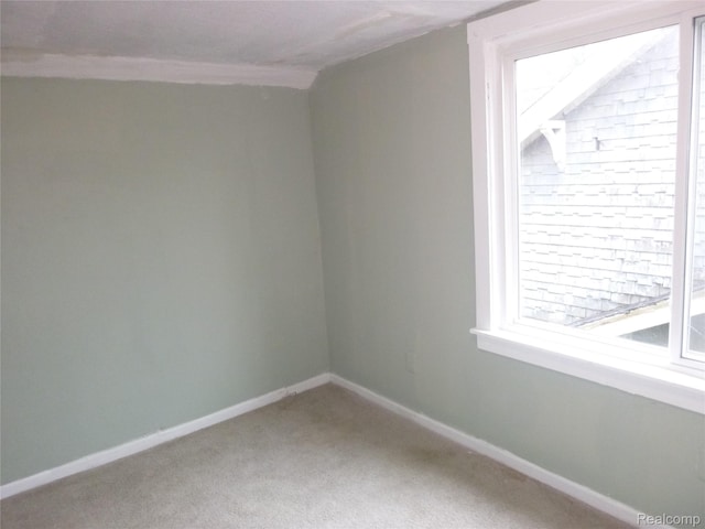 5266 Three Mile Dr, Detroit, MI 48224 - unfurnished room with baseboards and carpet floors