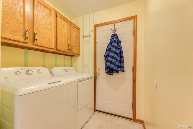 1908 Grant Pl, Port Huron, MI 48060 - laundry room with cabinet space, separate washer and dryer, and light tile patterned floors