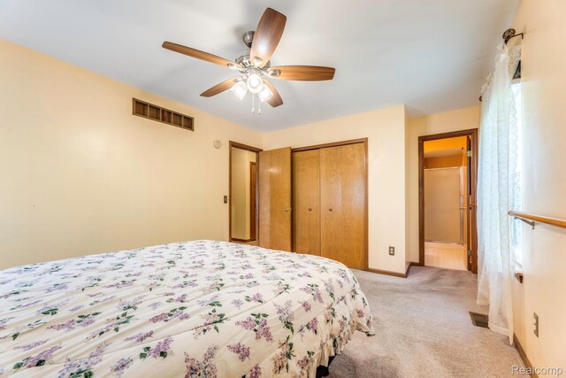 1908 Grant Pl, Port Huron, MI 48060 - bedroom featuring light carpet, a closet, baseboards, and ceiling fan