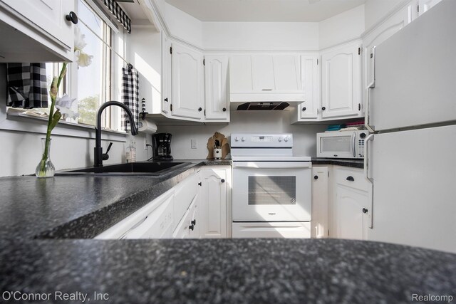 105 Gratiot Blvd, Marysville, MI 48040 - kitchen featuring white appliances, white cabinetry, a sink, and under cabinet range hood