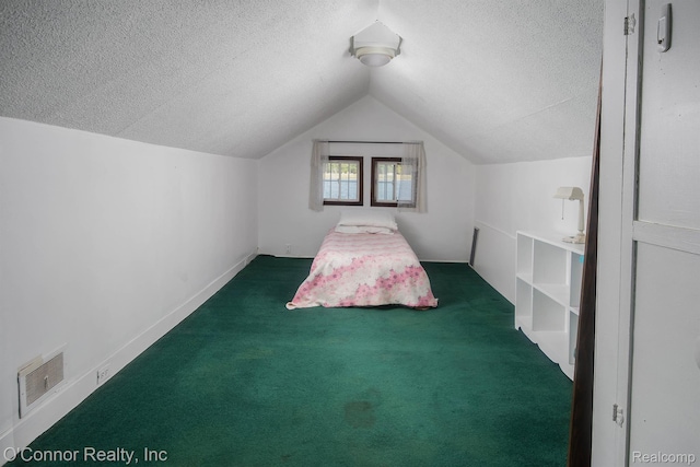 105 Gratiot Blvd, Marysville, MI 48040 - unfurnished bedroom featuring a textured ceiling, vaulted ceiling, and carpet flooring