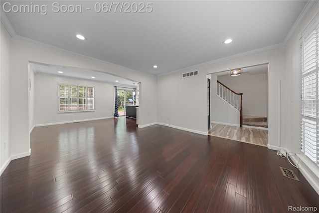 1633 Fleetwood Dr, Troy, MI 48098 - unfurnished living room with stairway, ornamental molding, wood finished floors, recessed lighting, and baseboards
