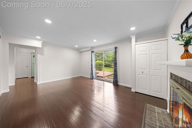 1633 Fleetwood Dr, Troy, MI 48098 - unfurnished living room with a tiled fireplace, recessed lighting, baseboards, dark wood-style floors, and ornamental molding