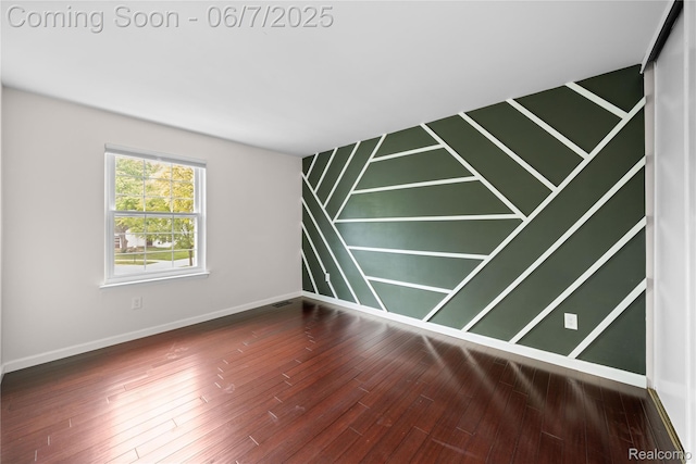 1633 Fleetwood Dr, Troy, MI 48098 - spare room with baseboards and wood finished floors