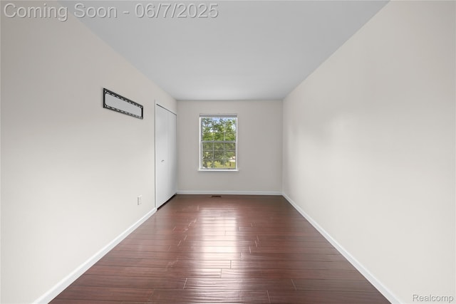 1633 Fleetwood Dr, Troy, MI 48098 - empty room with baseboards and dark wood finished floors