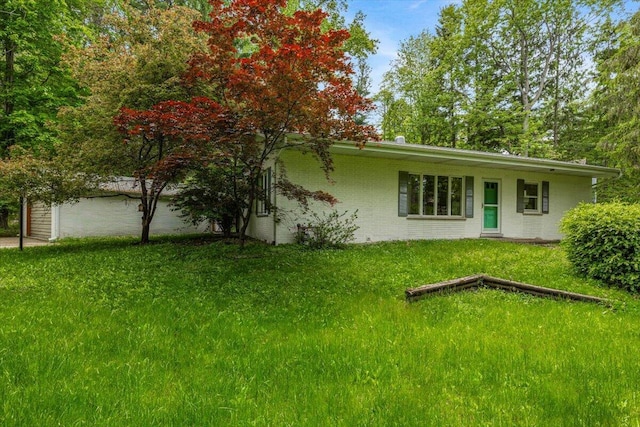 12270 Linden Ave, Sawyer, MI 49125 - rear view of property with a lawn and brick siding