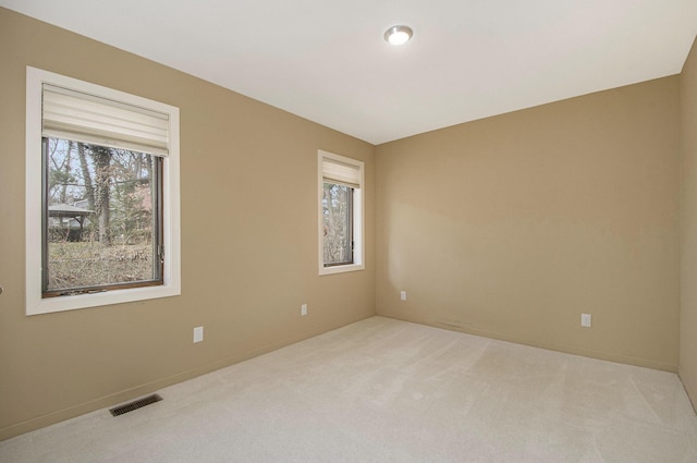 7362 30th St SE, Ada, MI 49301 - spare room with carpet and baseboards