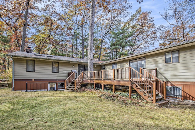 7362 30th St SE, Ada, MI 49301 - rear view of property with stairs, a deck, and a lawn