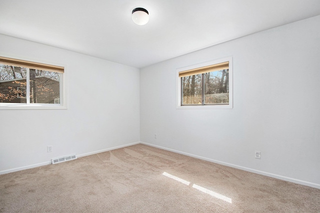 7362 30th St SE, Ada, MI 49301 - unfurnished room with carpet flooring and baseboards