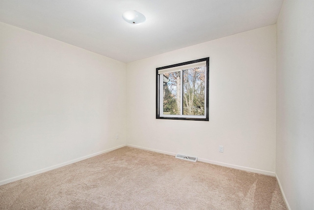 7362 30th St SE, Ada, MI 49301 - unfurnished room with light colored carpet and baseboards