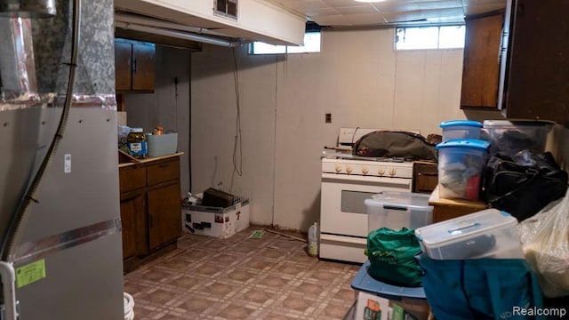 4107 Windward Dr, Lansing, MI 48911 - basement featuring light flooring and heating unit