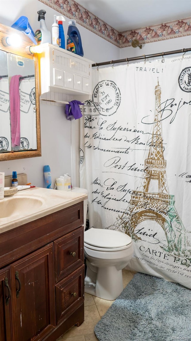 4107 Windward Dr, Lansing, MI 48911 - bathroom featuring vanity, tile patterned flooring, toilet, and curtained shower