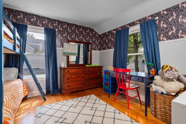 1512 Shadford Rd, Ann Arbor, MI 48104 - bedroom with a wainscoted wall, wood-type flooring, multiple windows, and wallpapered walls