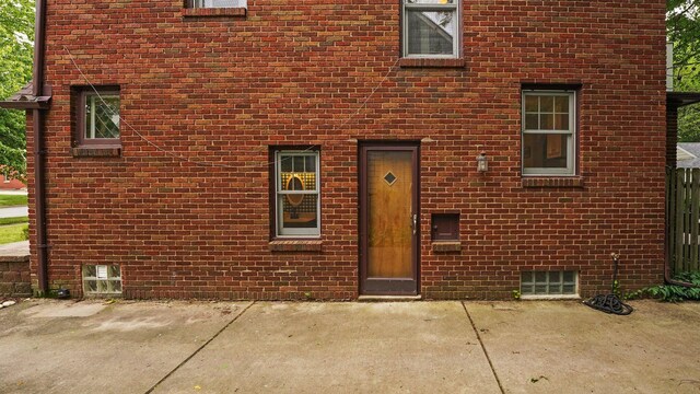 1512 Shadford Rd, Ann Arbor, MI 48104 - property entrance featuring brick siding and a patio