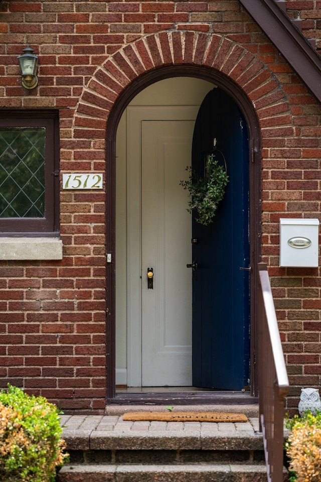 1512 Shadford Rd, Ann Arbor, MI 48104 - view of exterior entry featuring brick siding