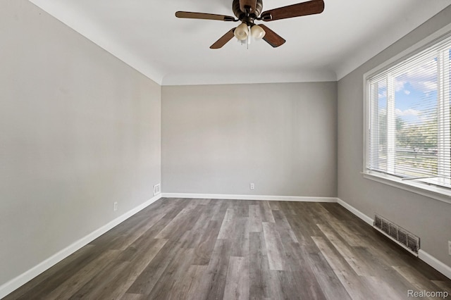 1621 Greenbrook Ln, Flint, MI 48507 - spare room featuring ceiling fan and dark wood finished floors