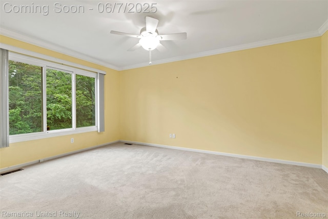 2663 Maple Forest Dr, Wixom, MI 48393 - empty room with carpet flooring, baseboards, ornamental molding, and a ceiling fan